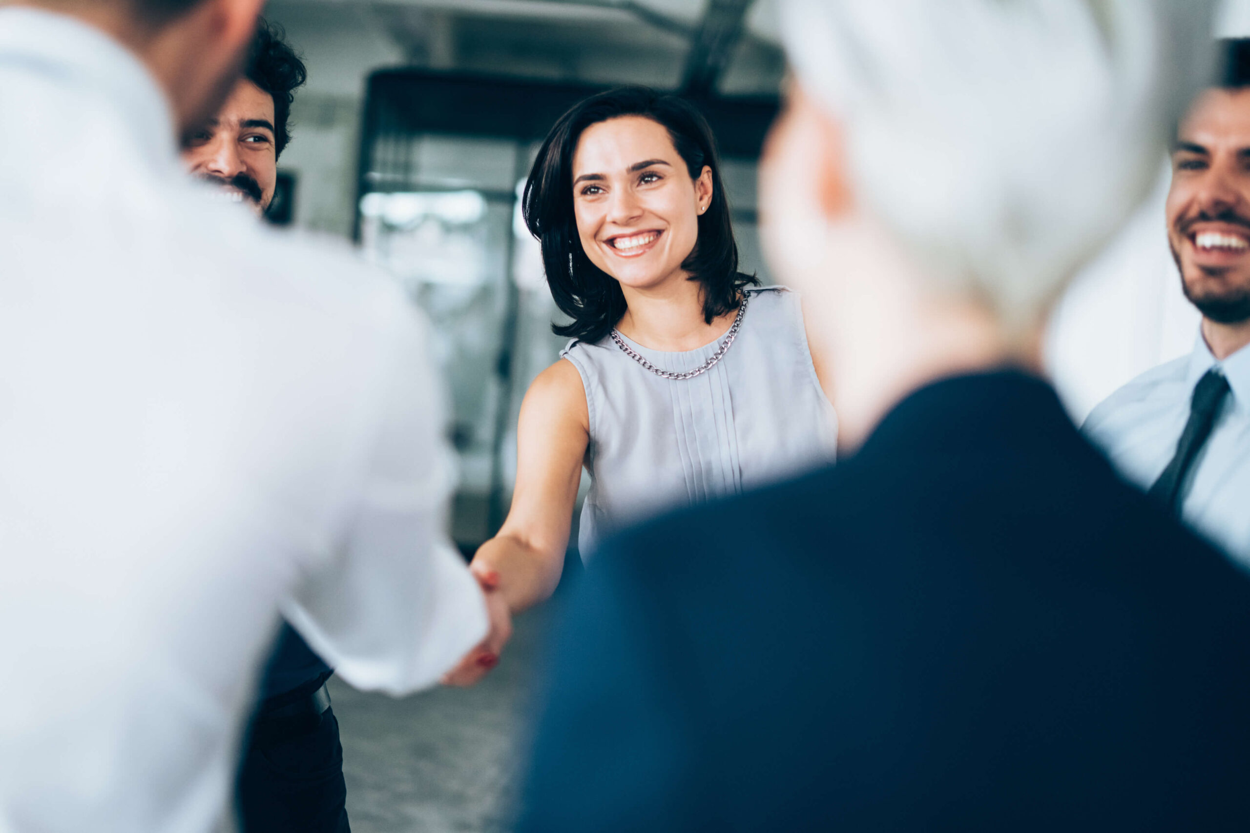 corporate job candidate meets interview team