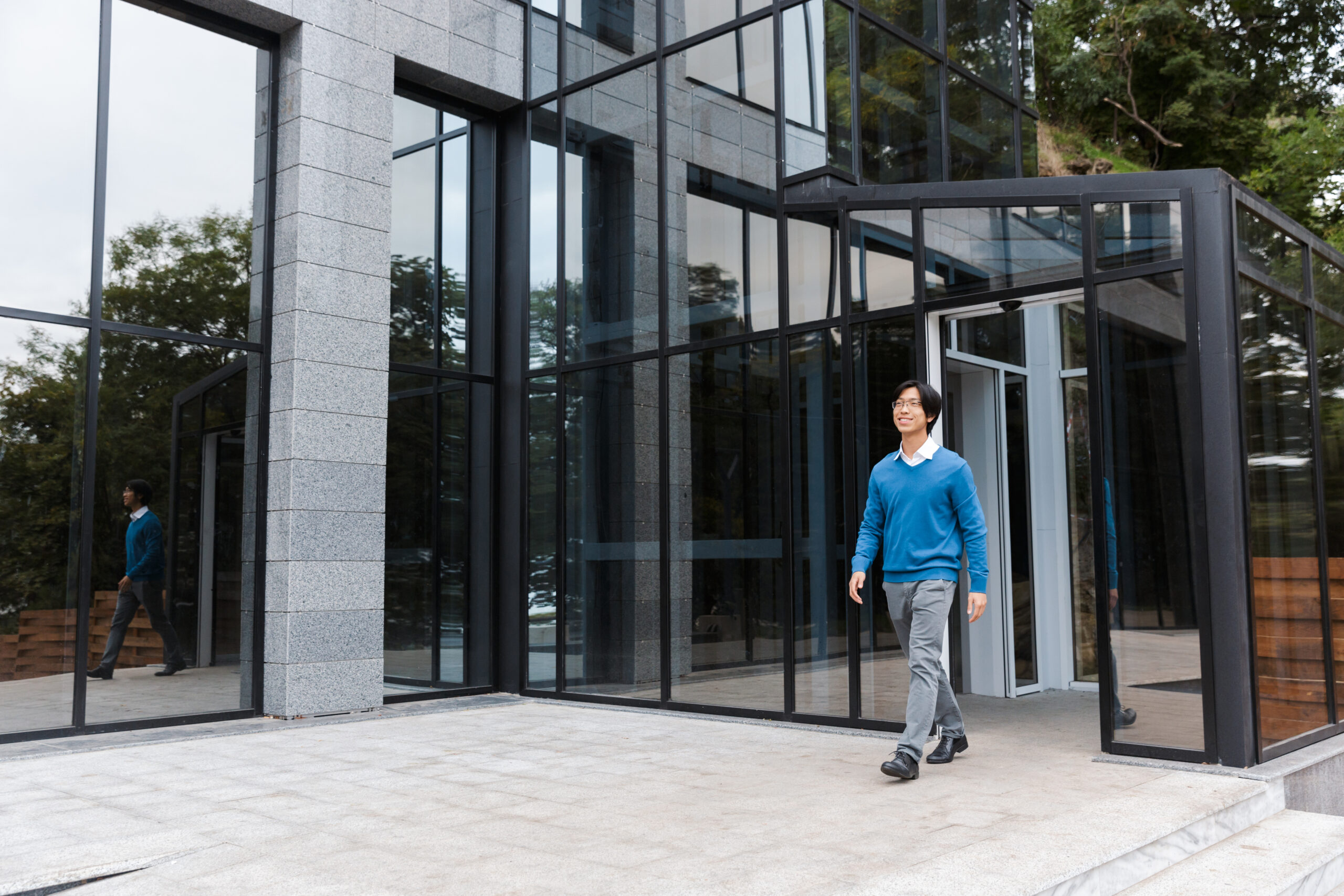 man-walking-outside-enterprise-company