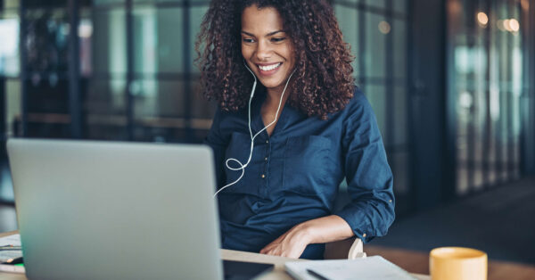 young business professional computer earbuds