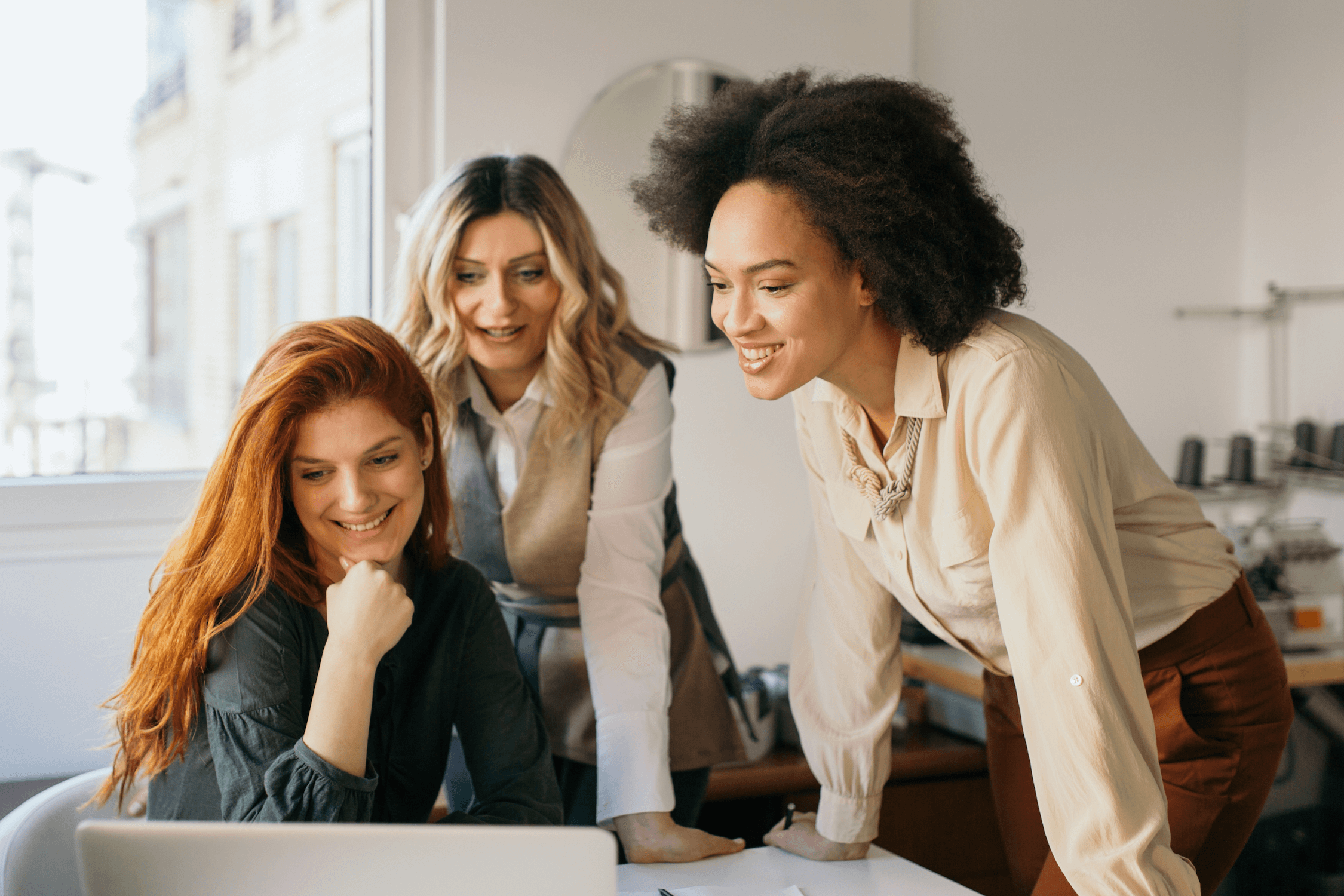 businesswomen discuss work project